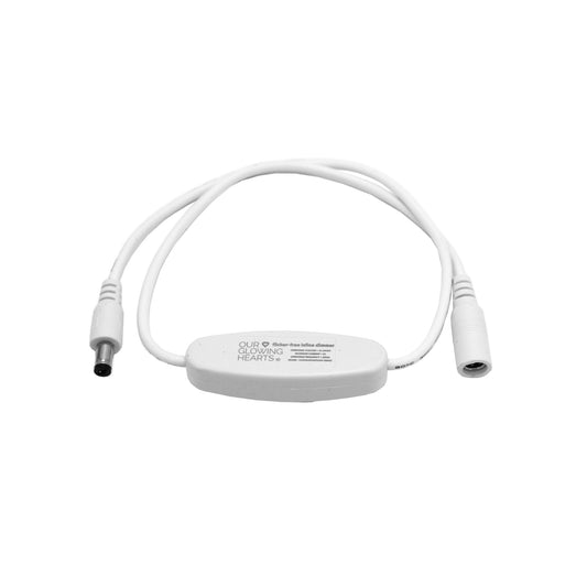 Back view of LED neon dimmer showing Our Glowing Hearts flicker-free inline dimmer label and DC connectors