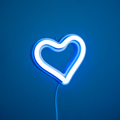 Front view of cyan neon heart ornament with hanging hook glowing against a blue background - 3 inch LED neon heart light by Our Glowing Hearts
