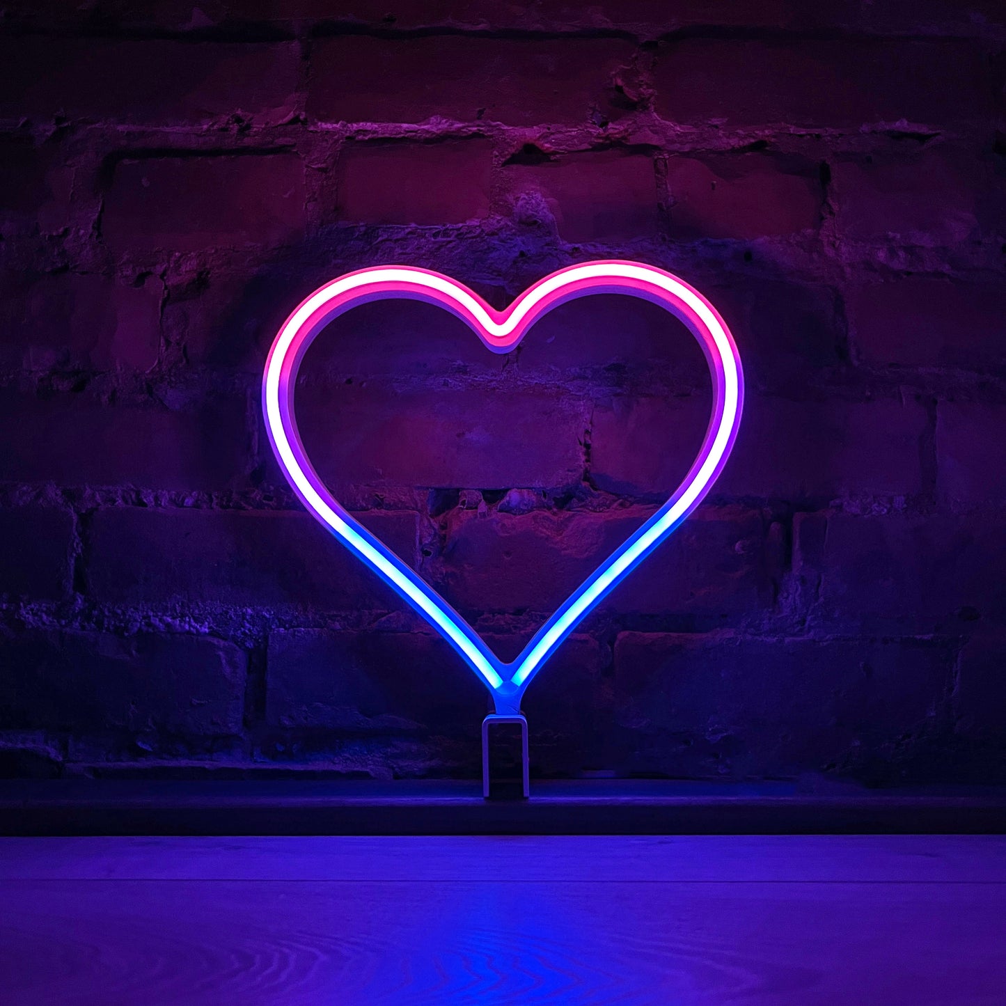 Neon Queer Heart art in bisexual pride flag colors - pink and blue LED neon heart light mode by Our Glowing Hearts