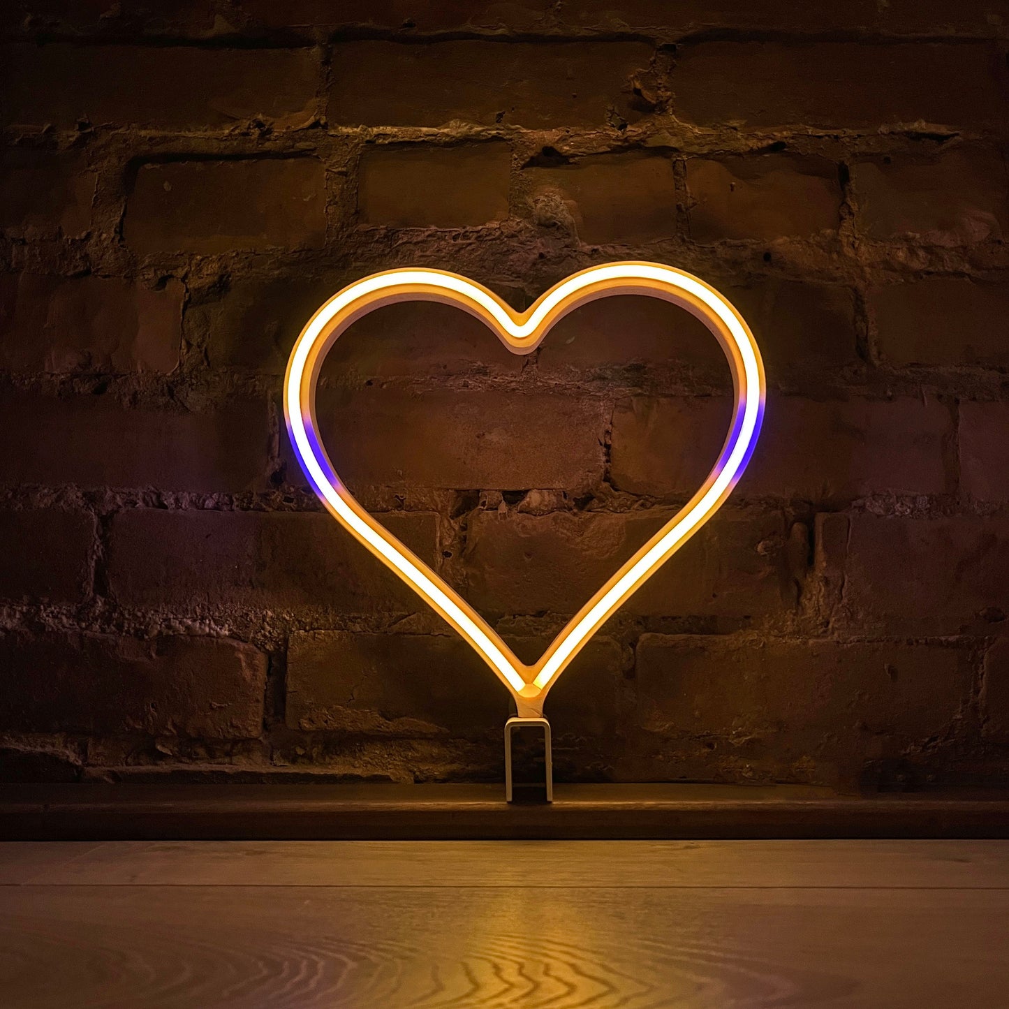 Neon Queer Heart art in intersex pride flag colors - orange yellow and purple LED neon heart light mode by Our Glowing Hearts