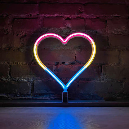 Neon Queer Heart art in pansexual pride flag colors - pink yellow and blue LED neon heart light mode by Our Glowing Hearts